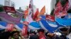 Members of South Korean Confederation of Trade Unions struggle with police officers during a rally against the Japanese government's decision to release treated radioactive water from Fukushima nuclear power plant, in Seoul, South Korea, July 6, 2023.