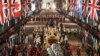 The Gold State Coach is ridden alongside members of the military during a full overnight dress rehearsal of the Coronation Ceremony of Britain’s King Charles and Camilla, Queen Consort in London, Britain.