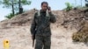 Foto yang dirilis oleh Media Militer Hizbullah menunjukkan komandan senior Hizbullah Wissam Tawil, yang tewas dalam serangan Israel di desa Kherbet Selem, Lebanon selatan, pada 8 Januari 2024.