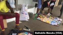 Vendors outside shops in Bulawayo