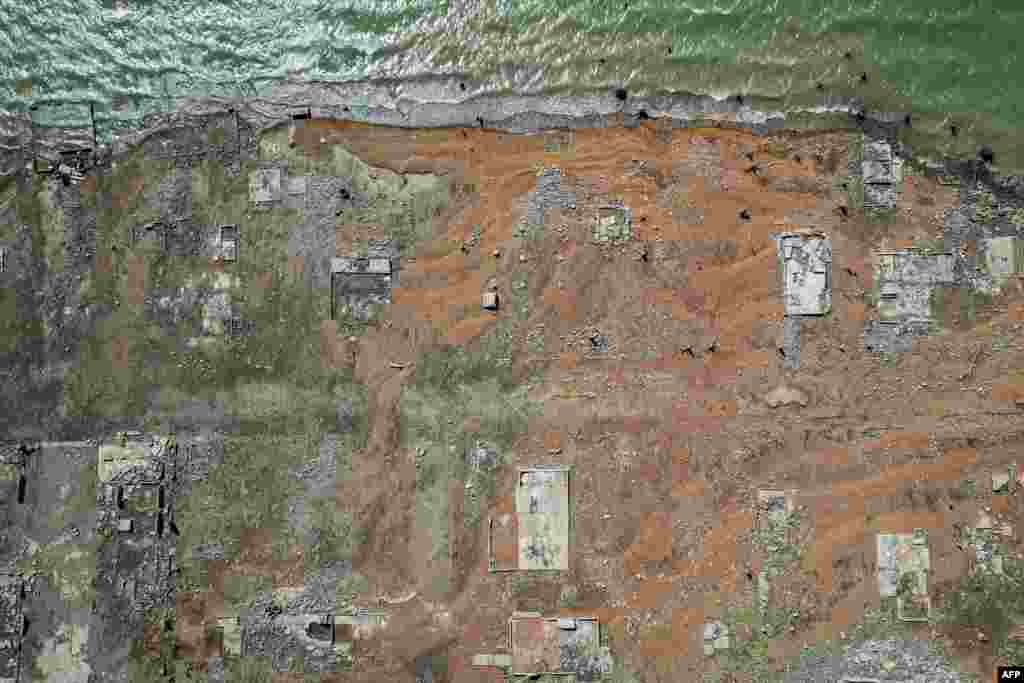 Remnants of the centuries-old town of Pantabangan reemerged in the northern Philippines after a dam’s water level dropped amid a drought that plagues many parts of the country.