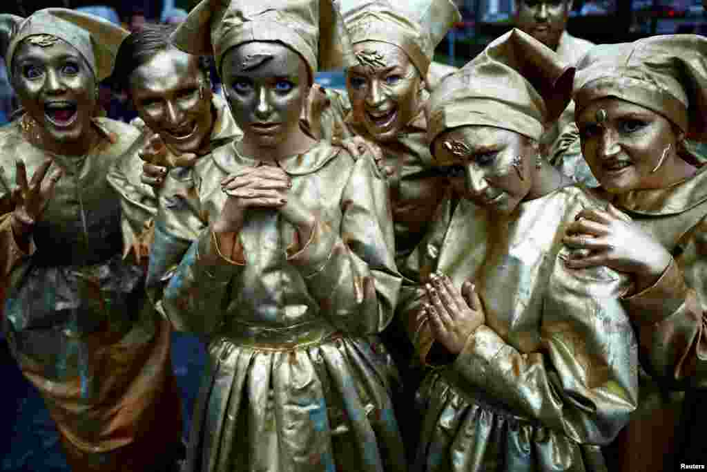 Members of street performance troupe Macnas perform their Halloween parade called "Cnamha La Loba", inspired by the legend of a wild wolf-woman who collects and preserves bones of animals, humans, and Gods, in Galway, Ireland, Oct. 29, 2023. 
