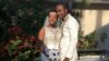 Foto Achiv: Jean-Dickens Toussaint ak madanm ni Abigail Michael Toussaint poze pou yon foto jou maryaj yo nan Pompano Beach, Florid. 