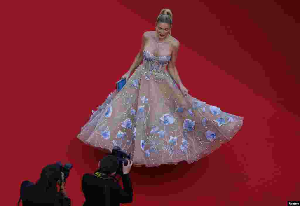Hofit Golan poses on the red carpet during arrivals for the screening of the film &quot;Horizon: An American Saga - Chapter 1&quot; Out of competition at the 77th Cannes Film Festival in Cannes, France.