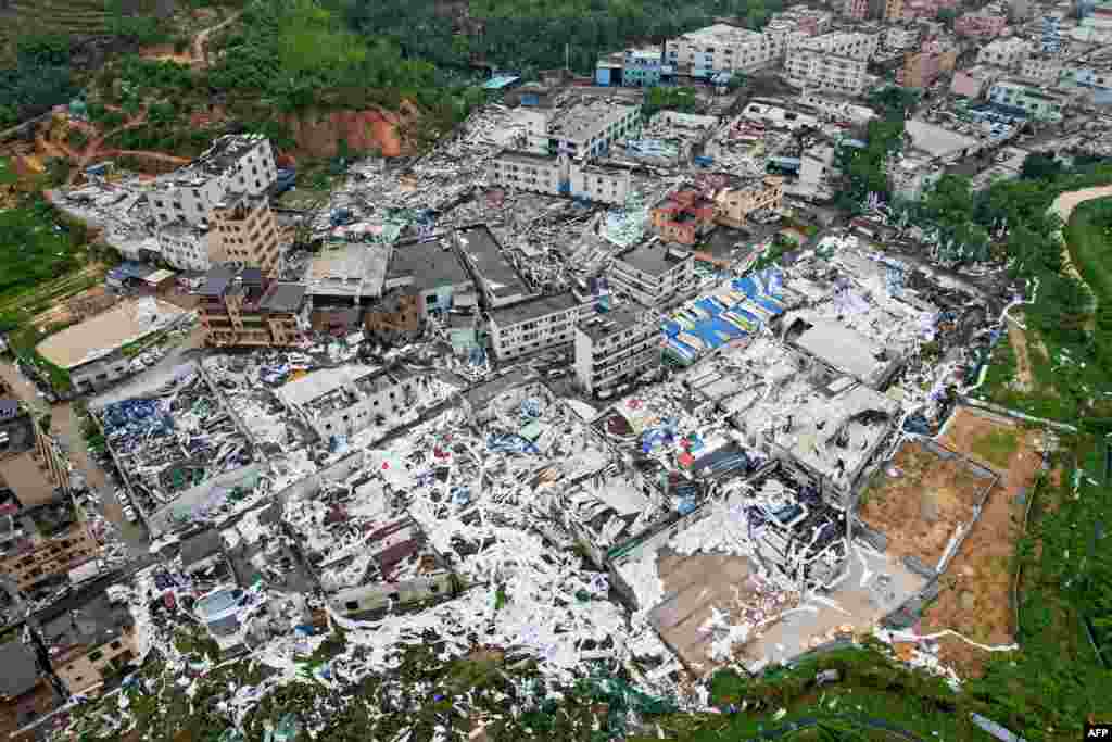 An aerial view shows destroyed and damaged buildings in an affected area after a tornado hit Guangzhou, in Southern China&#39;s Guangdong province.&nbsp;At least five people were killed and 33 injured after a tornado struck the city on April 27, state media reported.&nbsp;