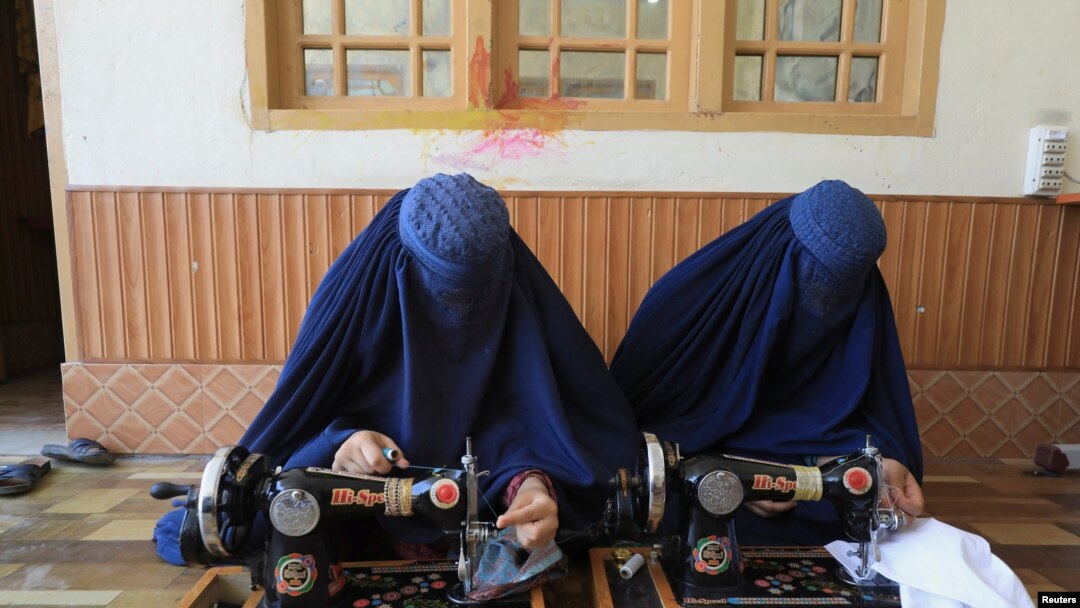 Afghan women attend tailoring class at the Skills Academy for Needy Aspirants (SANA) in Peshawar, Pakistan July 13, 2023. (REUTERS/Fayaz Aziz)