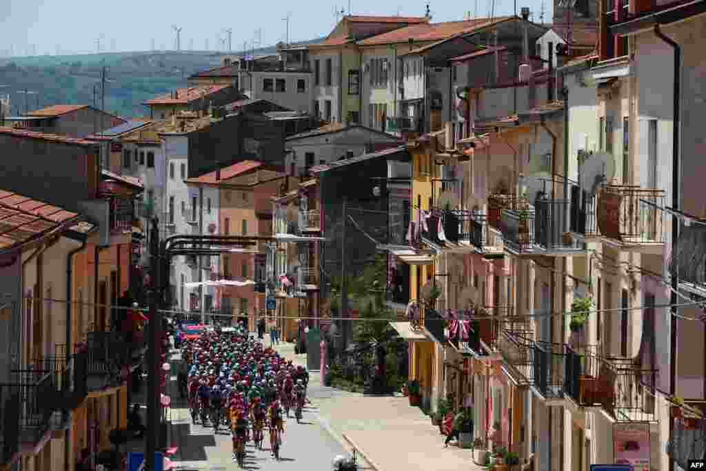 The pack rides in San Bartolomeo in Galdo during the 11th stage of the 107th Giro d&#39;Italia cycling race, 207km between Foiano di Val Fortore and Franca Villa al Mare, Italy.