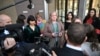 Transgender woman Roxanne Tickle, center, leaves the Federal Court of Australia in Sydney, Australia, Aug. 23, 2024. Tickle won a discrimination lawsuit against Giggle for Girls, a female-only social networking platform.