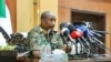 FILE - This handout image posted on the Sudanese Armed Forces's facebook page on Aug. 24, 2024, shows army chief General Abdel Fattah al-Burhan giving a press conference in Port Sudan, in the Red Sea state.