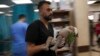 A Palestinian child wounded in an Israeli bombardment is carried into a hospital south of the Gaza Strip, Nov. 2, 2023. International humanitarian law seeks, for humanitarian reasons, "to limit the effects of armed conflict," says the International Committee of the Red Cross.