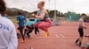 FILE - Spanish Paralympic athlete Adiaratou Iglesias, 25, warms up before the International Para Athletics Meeting, ahead of the Paris 2024 Paralympic Games, in L'Hospitalet de Llobregat, near Barcelona, Spain, April 27, 2024.