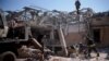 Ukrainian emergency personnel work among the rubble of a destroyed hotel following a Russian strike, amid the Russian invasion of Ukraine, in the town of Kramatorsk, Ukraine, Aug. 25, 2024. 