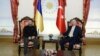 In this handout photo released by Turkish Presidency, Turkey's President Recep Tayyip Erdogan, right, sits next to Ukraine's President Volodymyr Zelenskyy during their meeting at Dolmabahce palace in Istanbul, Turkey, March 8, 2024.