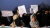 FILE - Muslim women take part in a protest organized by All India Majlis-e-Ittehadul Muslimeen (AIMM) against the recent hijab ban in few colleges of Karnataka state, at Shaheen Bagh in New Delhi, India, Feb. 9, 2022. 