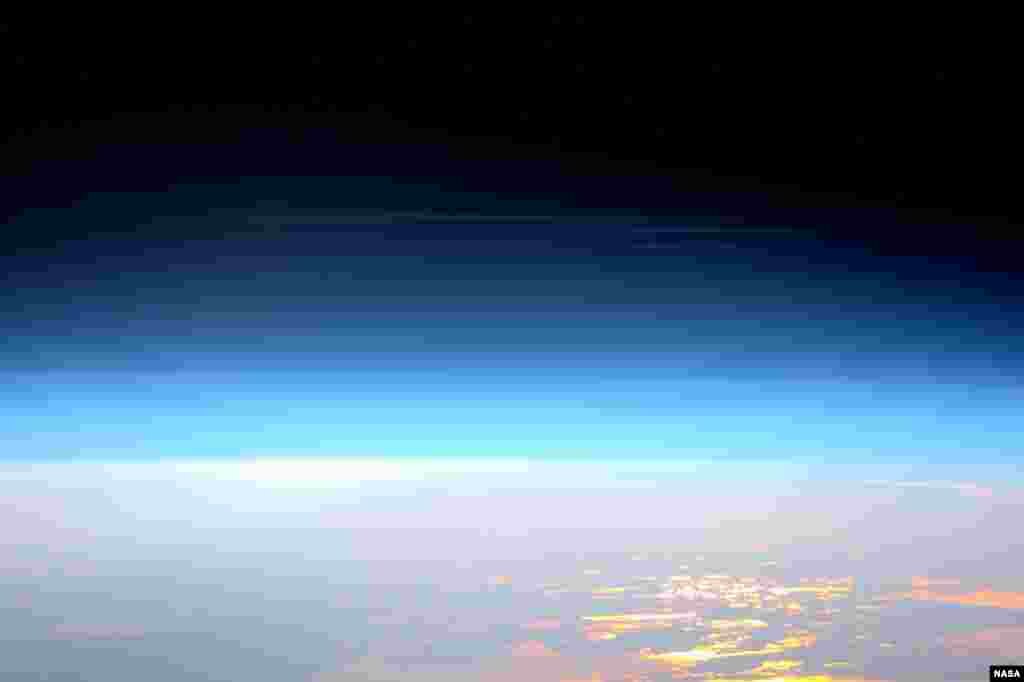 Expedition 47 Flight Engineer Tim Peake of the European Space Agency photographed rare, high-altitude noctilucent or "night shining" clouds from the International Space Station on May 29, 2016. (Credit: ESA/NASA)