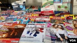 A Tunis newsstand with President Saied on the image of a prominent magazine. (Lisa Bryant/VOA)