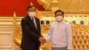Ketua Dewan Administrasi Negara Myanmar Jenderal Senior Min Aung Hlaing (kanan), berjabat tangan dengan Menteri Luar Negeri Kamboja dan Utusan Khusus ASEAN untuk Myanmar Prak Sokhonn di Naypyitaw, Myanmar, Senin, Maret 21 Oktober 2022. (Military True News Information Team via AP)