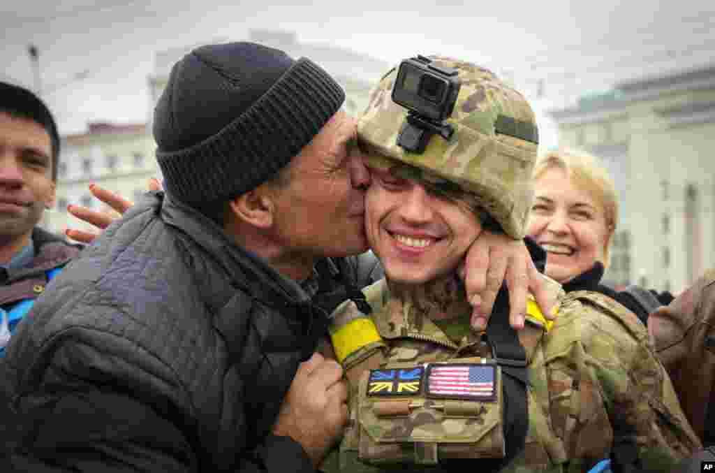 A Kherson resident kisses a Ukrainian soldier in central Kherson.&nbsp;The Russian retreat from Kherson marked a triumphant milestone in Ukraine&#39;s pushback against Moscow&#39;s invasion almost nine months ago.