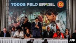Brazil's presidential candidate for the Workers' Party Fernando Haddad speaks during a meeting with a group of evangelical pastors, in Sao Paulo, Oct. 17, 2018.