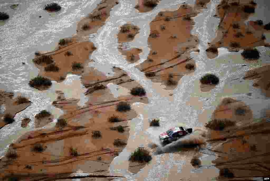 Toyota's driver Giniel De Villiers and co-driver Dennis Murphy of South Africa compete during Stage 9 of the Dakar 2023 rally between Riyadh and Haradh in Saudi Arabia.