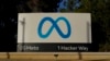 Meta's logo can be seen on a sign at the company's headquarters in Menlo Park, Calif., Nov. 9, 2022. Meta, which is Facebook's parent company, announced it is laying off 11,000 people, about 13% of its workforce.