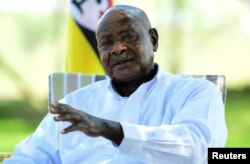 FILE - Uganda's President Yoweri Museveni speaks during an interview at his farm in Kisozi settlement of Gomba district, in the Central region of Uganda, Jan. 16, 2022.
