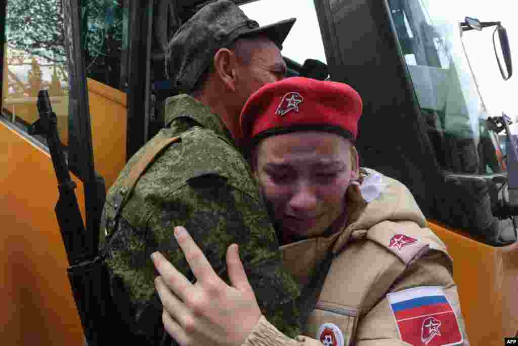 Reservists drafted during the partial mobilization attend a departure ceremony in Sevastopol, in Russian-occupied Crimea.&nbsp;Russian President Vladimir Putin announced on Sept. 21 a mobilization of hundreds of thousands of Russian men to bolster Moscow&#39;s army in Ukraine, sparking demonstrations and an exodus of men abroad.