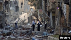 Salah satu sudut wilayah Deir al-Zor, pasca serangan bentrokan antara pasukan pemerintah dan pemberontak Suriah (Foto: dok). Human Right Watch dalam laporannya mengungkapkan adanya unsur kesengajaan dalam serangan terhadap warga sipil di Suriah, Kamis (11/4).