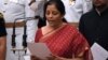India's ruling Bharatiya Janata Party (BJP) politician and member of parliament Nirmala Sitharaman takes the oath during the swearing-in ceremony of new ministers at the Presidential Palace in New Delhi, Sept. 3, 2017.