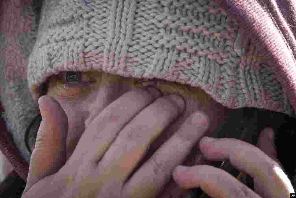 Masha Fesenko, from Kyiv, arrives at the border crossing in Medyka, Poland, March 8, 2022.&nbsp;Russia&#39;s invasion of Ukraine has set off the largest mass migration in Europe in decades, with more than 1.5 million people having crossed from Ukraine into neighboring countries.&nbsp;