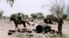 ARCHIVES - Le village de Khair Wajid au Darfour après avoir été brûlé par les milices "Janjaweed", avril 2004.