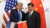 រូបឯកសារ៖ លោកប្រធានាធិបតី Donald Trump ថតរូបជាមួយប្រធានាធិបតីចិន លោក Xi Jinping អំឡុងពេលកិច្ចប្រជុំនៅខាងក្រៅកិច្ចប្រជុំ G20 នៅទីក្រុង Osaka ប្រទេសជប៉ុន ថ្ងៃទី២៩ ខែមិថុនា ឆ្នាំ២០១៩។