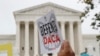 FILE - People rally outside the Supreme Court on Nov. 12, 2019, as oral arguments are heard in the case of President Trump's decision to end the Obama-era, Deferred Action for Childhood Arrivals program.
