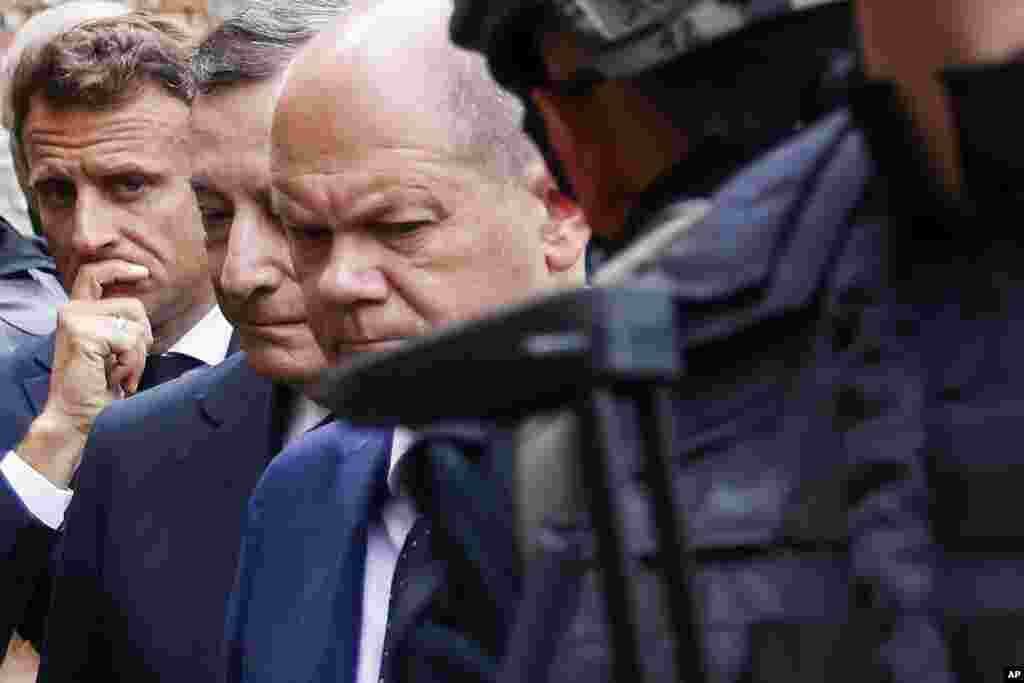 French President Emmanuel Macron, left, Italian Prime Minister Mario Draghi, center, and German Chancellor Olaf Scholz visit Irpin, outside Kyiv, Ukraine, in a show of collective European support for the Ukrainian people as they resist Russia&#39;s invasion.