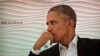 Former U.S. President Barack Obama listens to a question during a leadership summit in New Delhi, India, Dec. 1, 2017. 