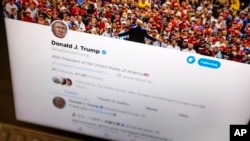 FILE - President Donald Trump's Twitter feed is photographed on an Apple iPad in New York, June 27, 2019.