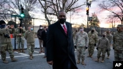 Secretary of Defense Lloyd Austin visits National Guard troops deployed at the U.S. Capitol and its perimeter, Jan. 29, 2021 on Capitol Hill in Washington.