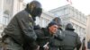 Russian police detain a participant during an opposition rally protesting Vladimir Putin's presidential victory, in St. Petersburg, March 5, 2012. 