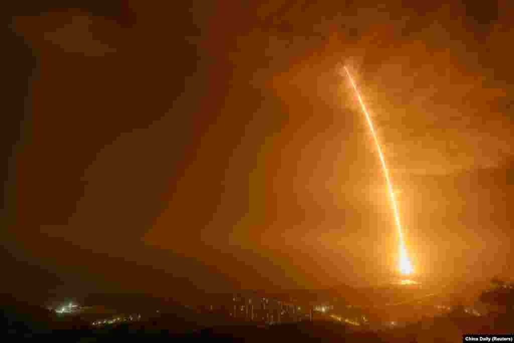 The Long March-7 Y3 rocket carrying the automated cargo resupply spacecraft Tianzhou-2 as one of the missions to complete China&#39;s space station, takes off from Wenchang Space Launch Center in Hainan province, May 29, 2021.