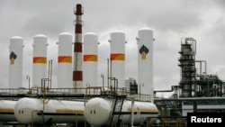 A general view shows the Achinsk oil refining factory, owned by the Rosneft company, outside the town of Achinsk, some 188 km (117 miles) west of Krasnoyarsk, Russia, Oct. 28, 2013.
