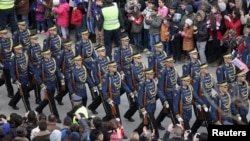 Members of the Kosovo Security Force march during a celebration marking the fifth anniversary of Kosovo's secession from Serbia in Pristina February 17, 2013.
