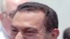 Egyptian President Hosni Mubarak looks happy Monday, June 26, 1995 after his arrival in Egypt from Ethiopia. Mubarak returned home after surviving a failed assassination attempt in Addis Ababa when his motorcade was fired on by seven gunmen enroute to a m