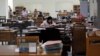FILE - Employees work at the Central Bank's headquarters in Naypyitaw, Myanmar.