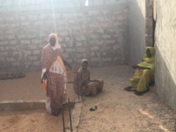 M’Barka and her family are still waiting for a court decision on their case, eight years after it was opened (E. Sarai/VOA)