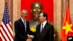 Barack Obama et Tran Dai Quang au palais présidentiel à Hanoi, Vietnam, le 23 mai 2016.(AP Photo/Carolyn Kaster)