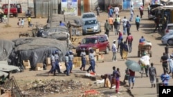 Liyamemetheka igciwane leCOVID-19 eZimbabwe. (AP Photo/Tsvangirayi Mukwazhi)
