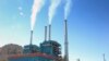 FILE - Smoke rises from the Colstrip Steam Electric Station, a coal burning power plant in in Colstrip, Mont.