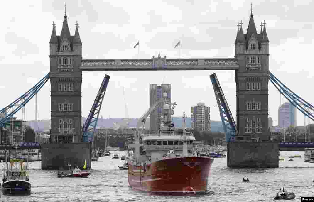 A flotilla of fishing vessels campaigning to leave the European Union, including the Christina S, docks next to HMS Belfast on the river Thames in London, Britain.