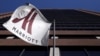 FILE - A Marriott flag hangs at the entrance of the New York Marriott Downtown hotel in Manhattan, New York.