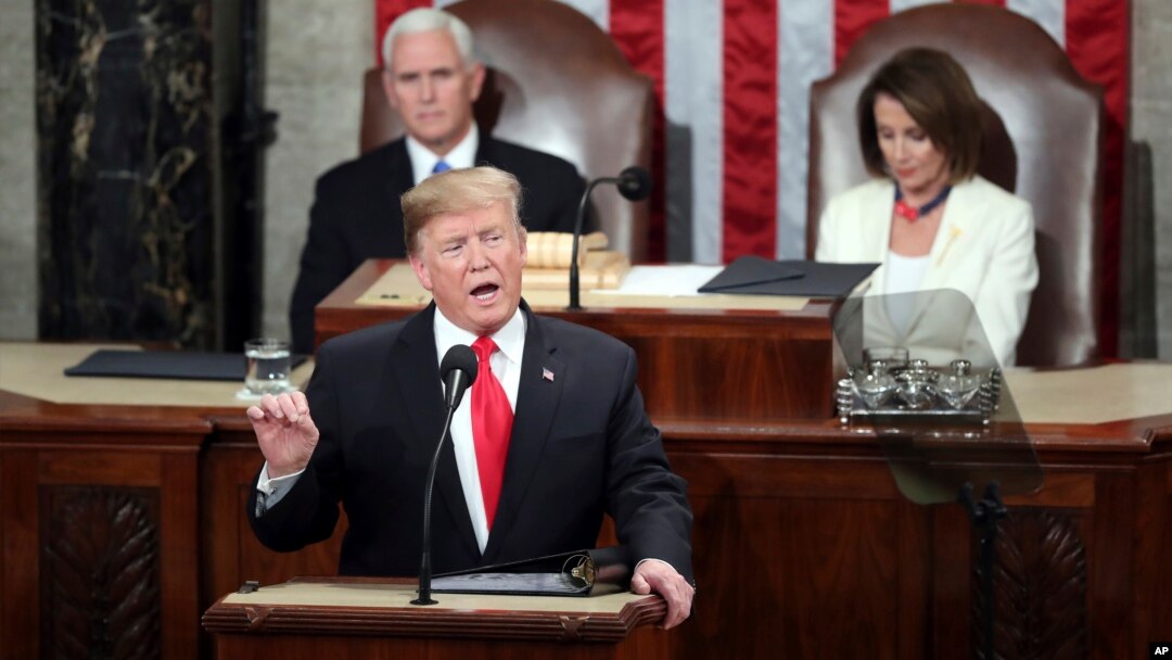 President Donald Trump delivers his State of the Union address to a joint session of Congress on Capitol Hill in Washington, as Vice President Mike Pence and Speaker of the House Nancy Pelosi, D-Calif., watch, Feb. 5, 2019. 